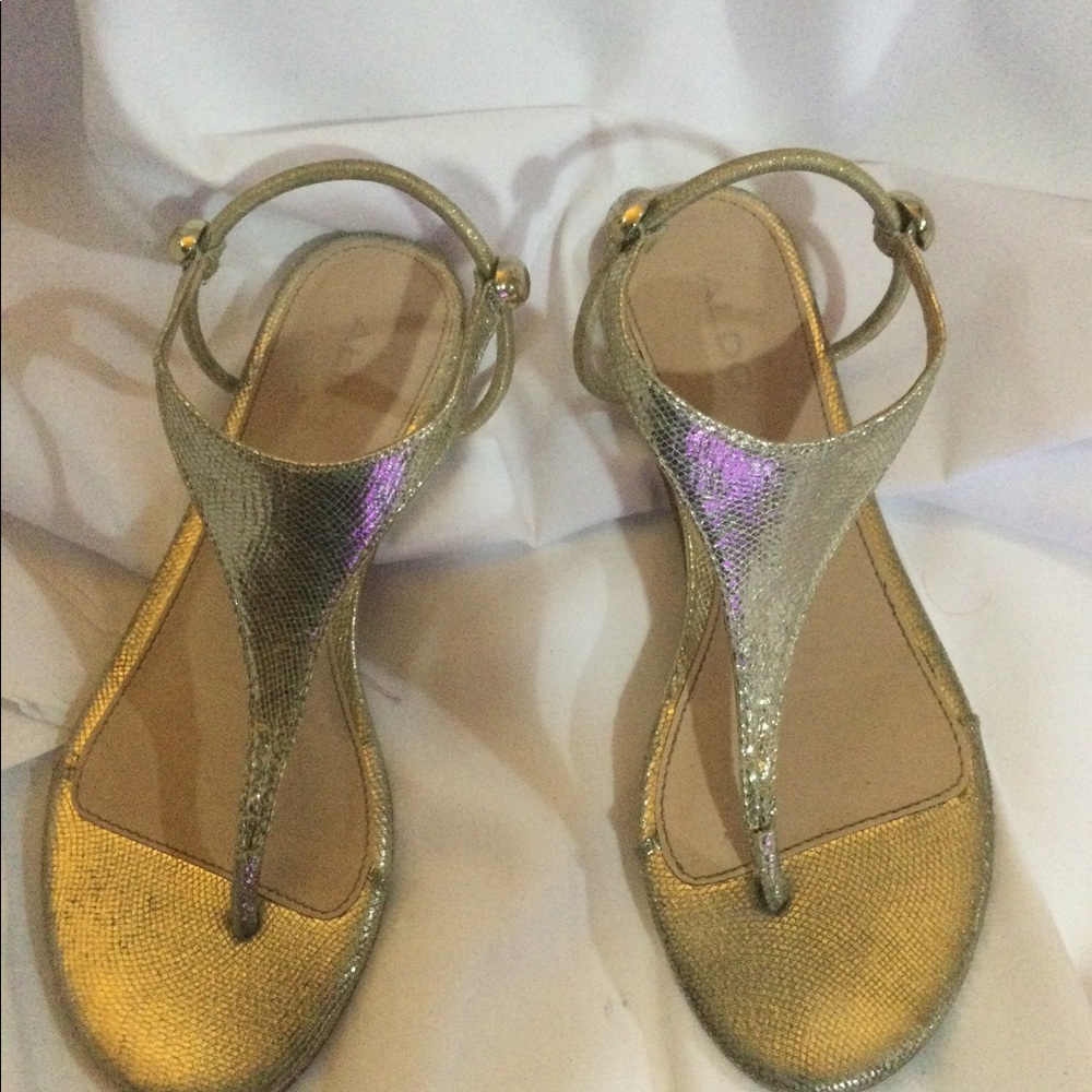 Aldo. Metallic Gold Sandals in size 6
